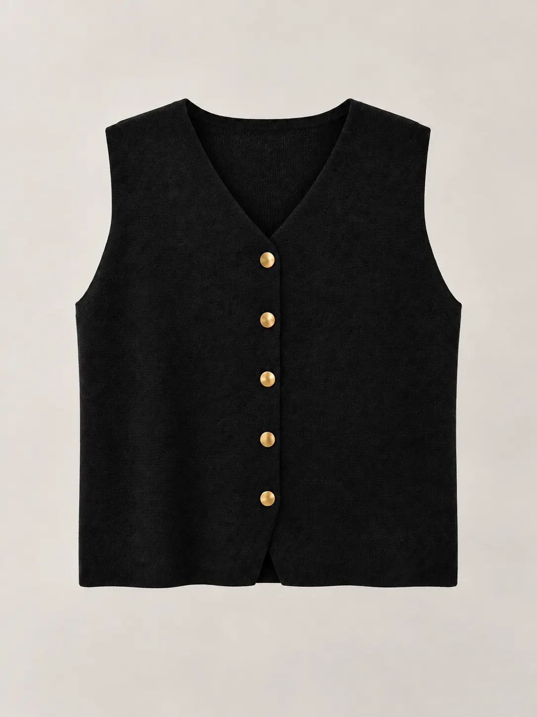 Chaleco negro con botones dorados