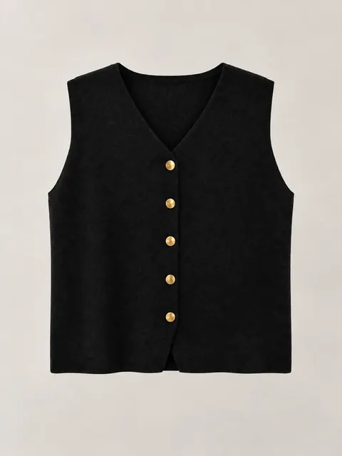 Chaleco negro con botones dorados