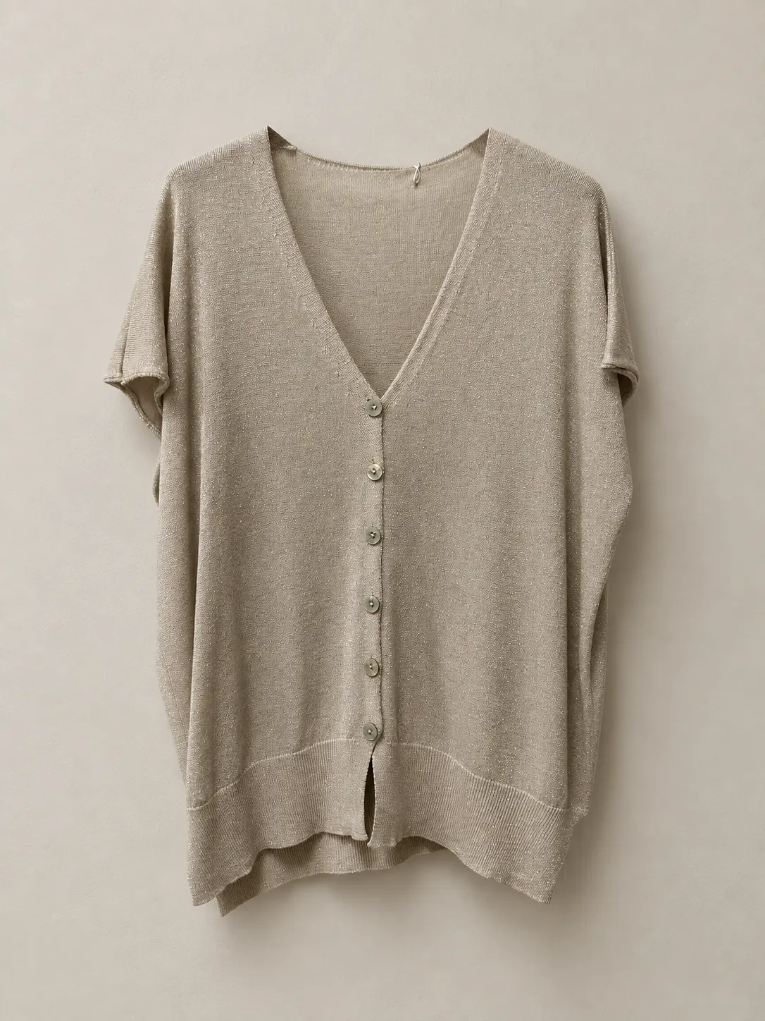 Punto beige con botones